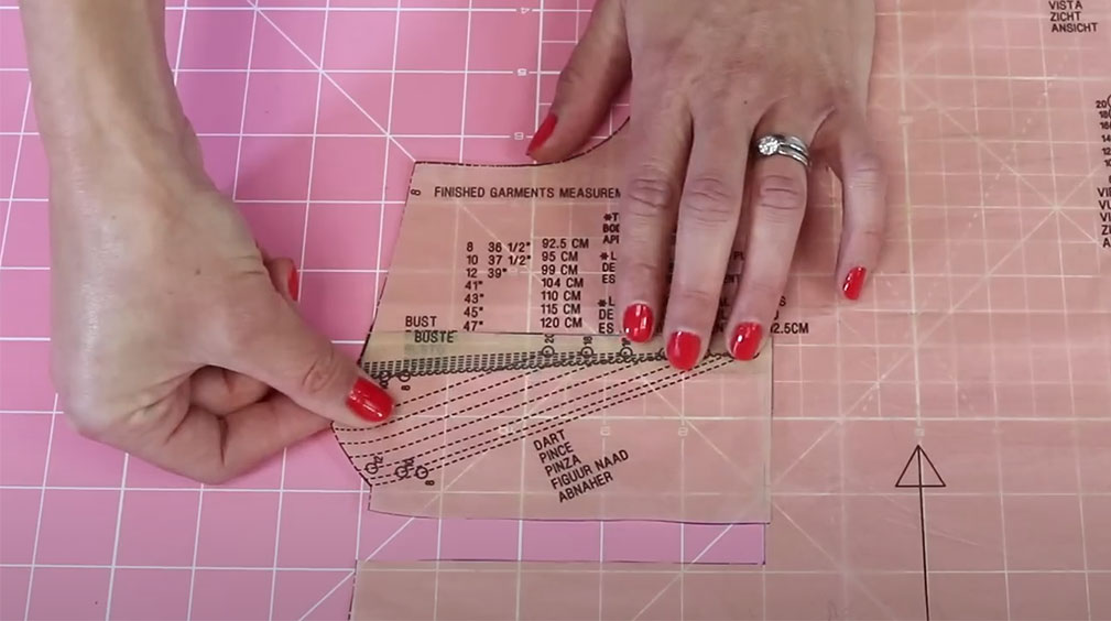 Sewing pattern piece with boxed dart cut out and moved